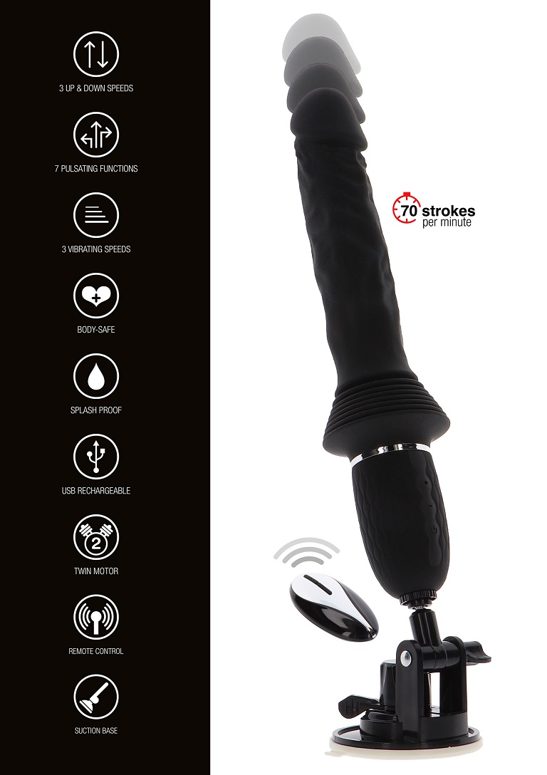 This thrusting vibrator is designed to fulfill your deepest ... ToyJoy - Magnum Opus Thruster - Black photo-9