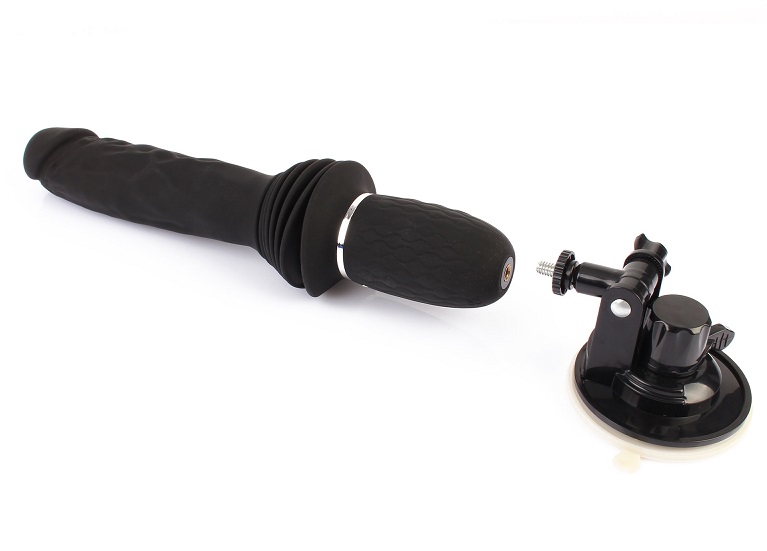 This thrusting vibrator is designed to fulfill your deepest ... ToyJoy - Magnum Opus Thruster - Black photo-3